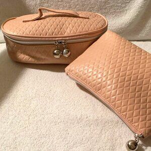 Two small pink makeup bags by Lancome